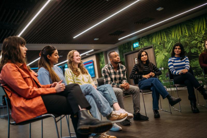 Students looking happy attending a workshop in the Cube